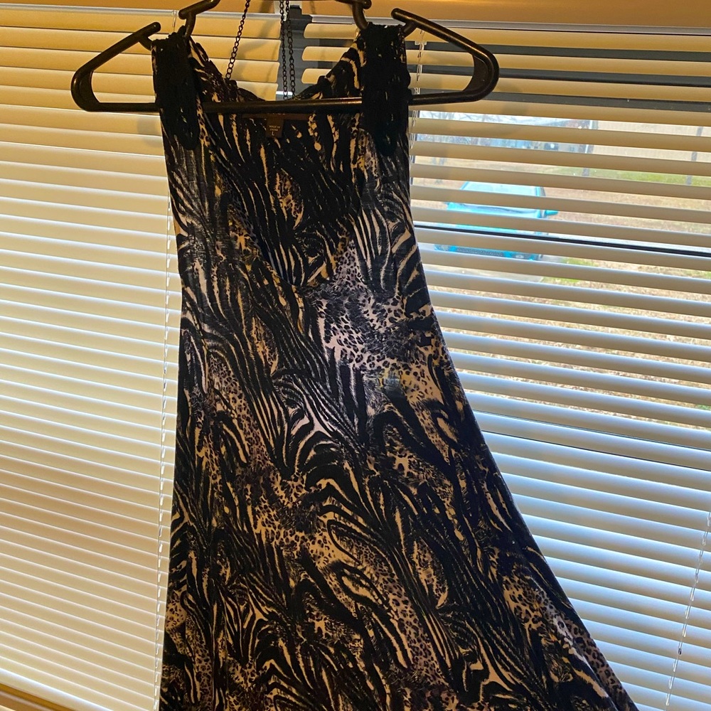 Zebra print type dress. It's got a jersey like feel and this is comfortable!!